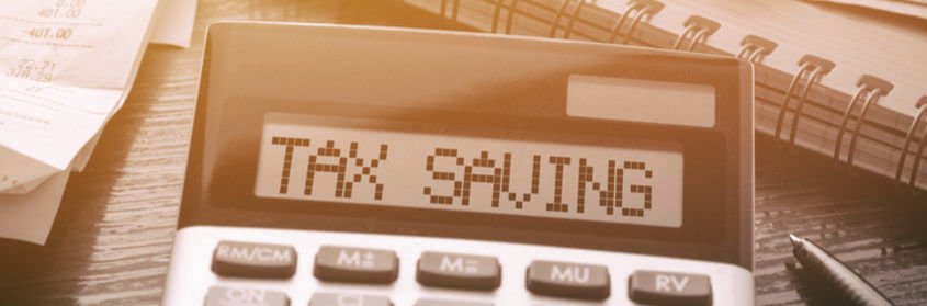 a calculator displaying tax saving
