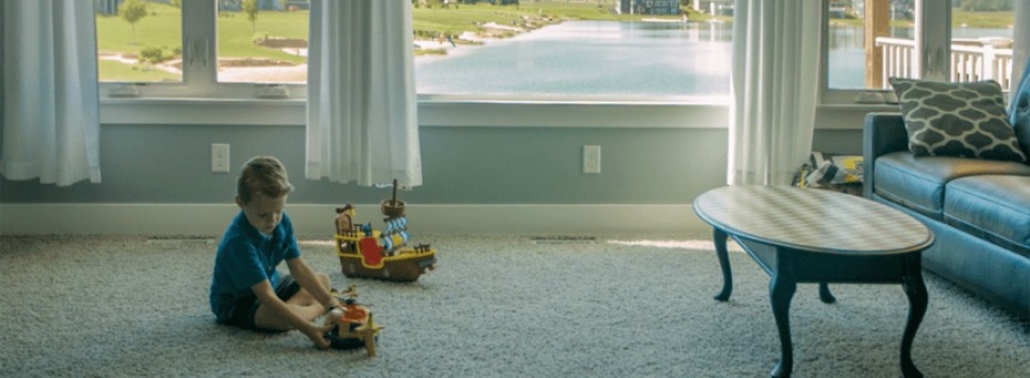 child playing in a living room