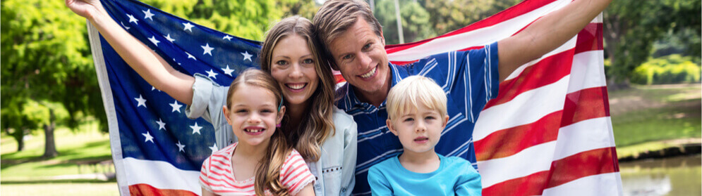 a family with a United States flag