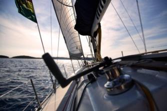 Sailboat under sail on open water, the kind of vessel that needs marine HVAC maintenance in Holland