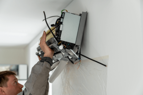 Technician working on a Zeeland ductless AC Repair