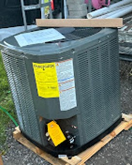 A brand new AC unit ready for installation by Mast Heating & Cooling in Holland MI.
